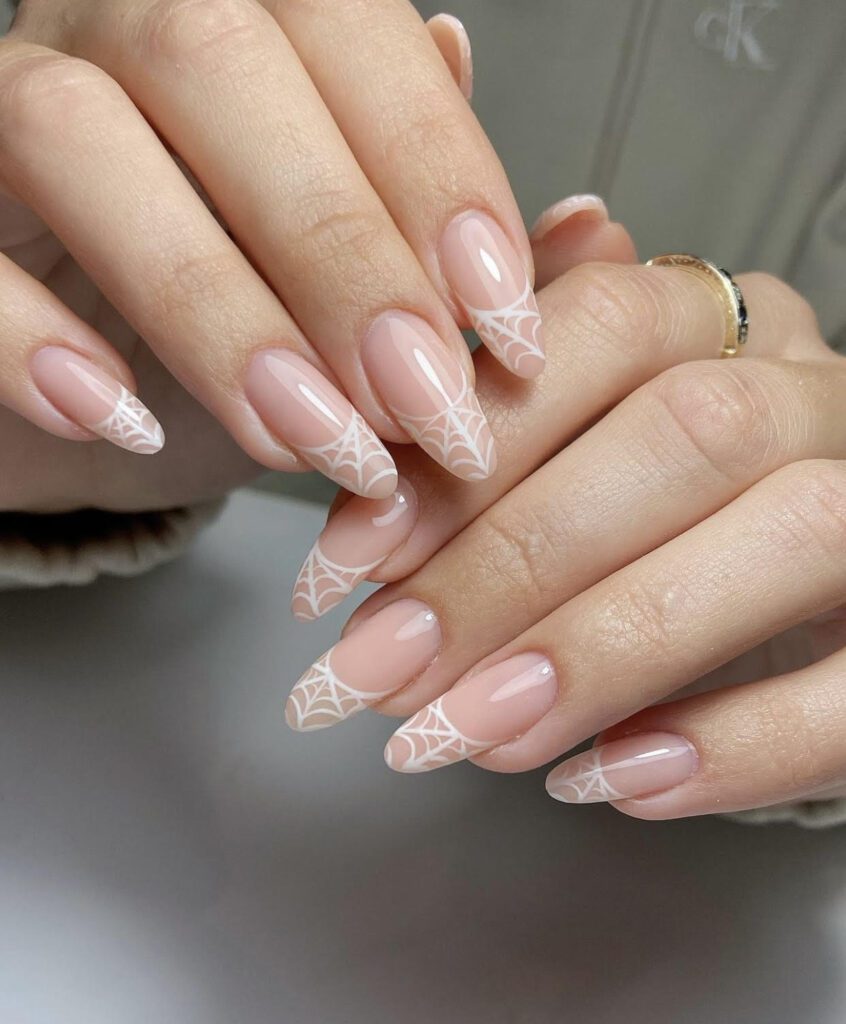white spider web design nails