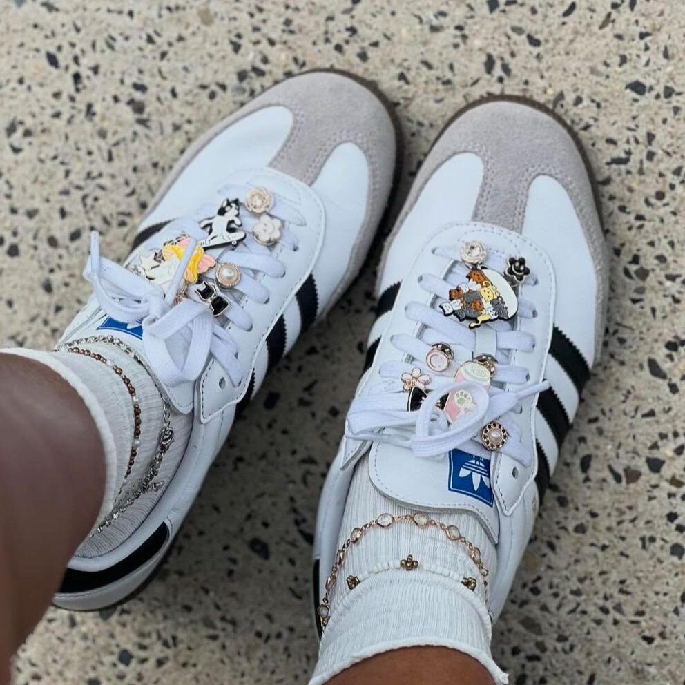 2025 micro trends, wearable trends, spring 2025 wearable fashion trends
, bag charms, shoe charms, bag charm 